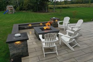 Concrete patio and custom fire pit with low-rise retaining walls, Penfield NY